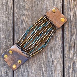 Multi strand cuff bracelet